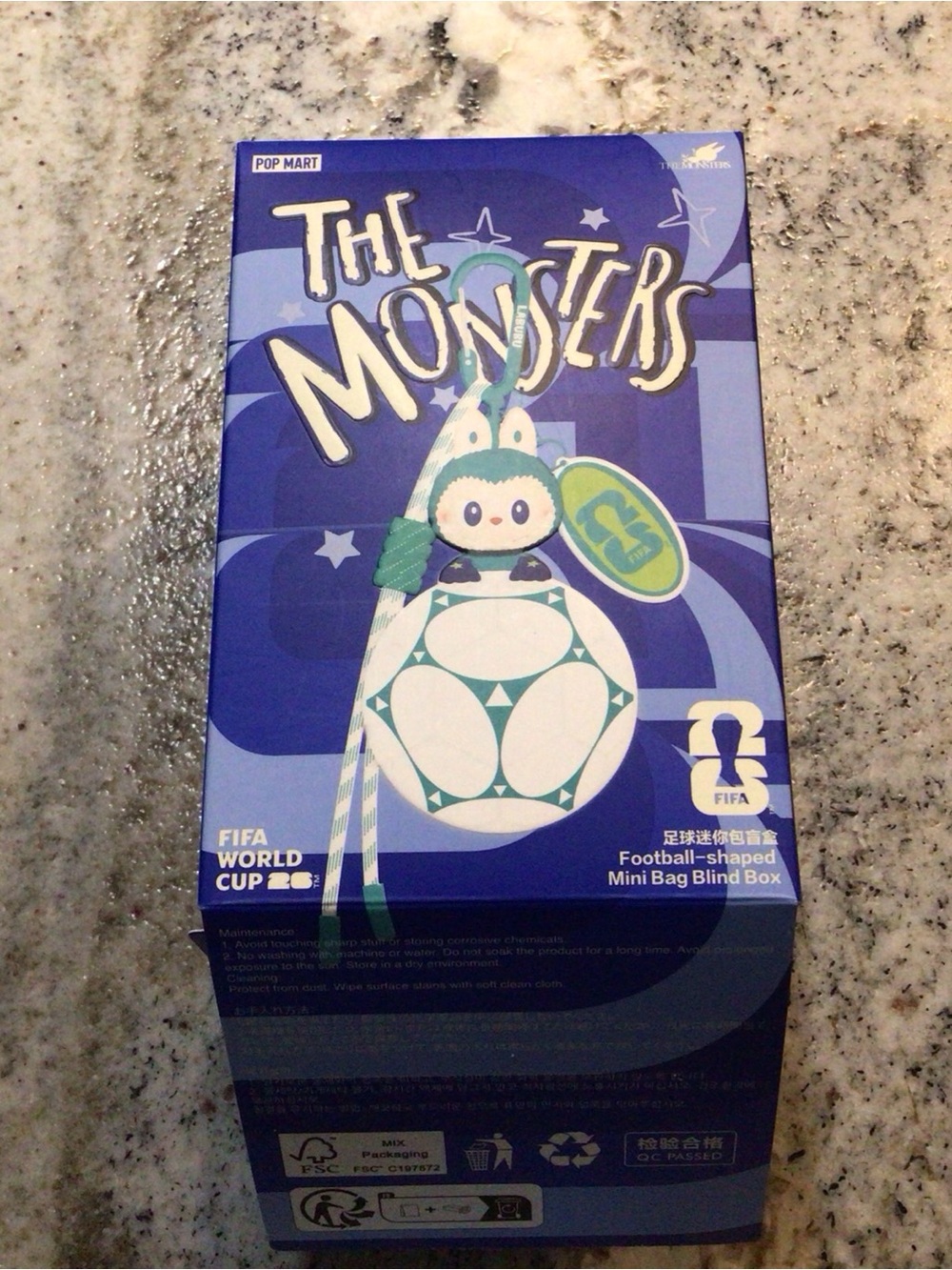 The Monsters Football-Shaped Mini Bag Keychain - Blue